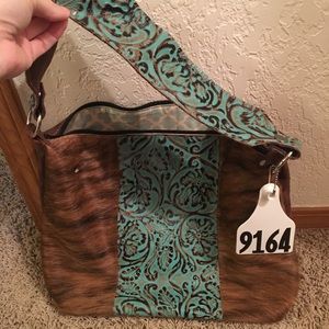 Cowhide and leather purse